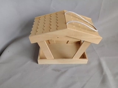 Bird feeder; Outdoor bird feeder; Wooden bird feeder; European outdoor bird feeder.